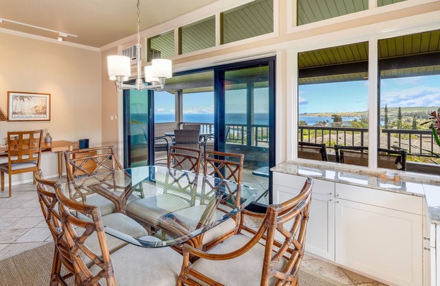 Ocean-view condo near the beach with outdoor pool, golf, balcony, grills, & AC