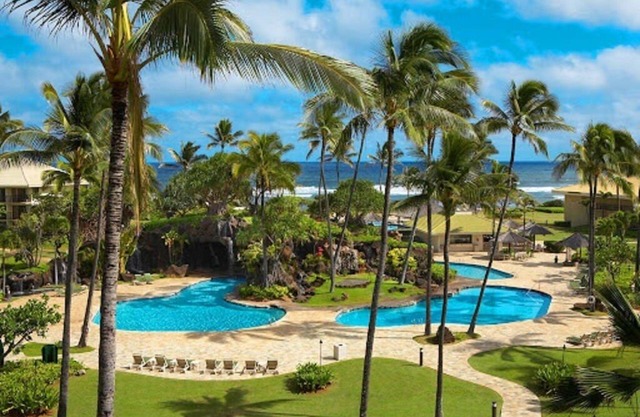 Oceanfront Kauai Beach Resort 75 foot waterslide, 4 pools, Jacuzzis, restaurants