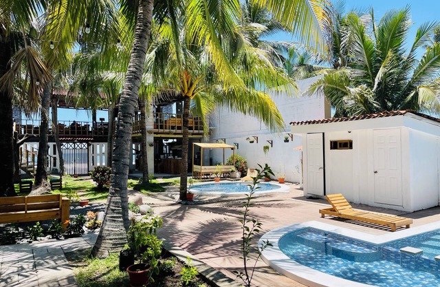 Oceanfront paradise steps away from the surf.