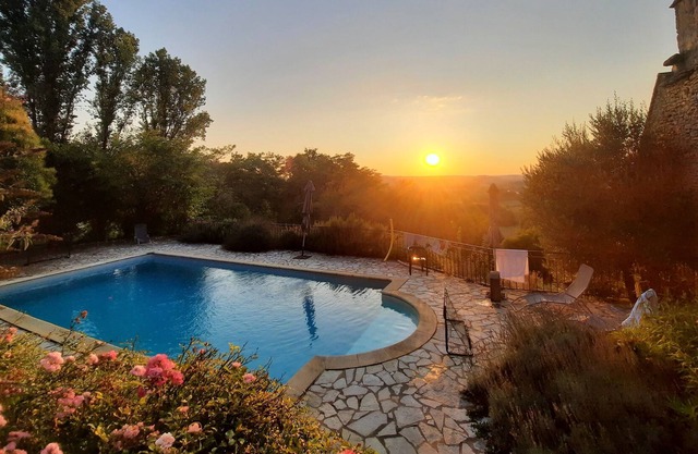 Old tobacco barn with a view of the Dordogne