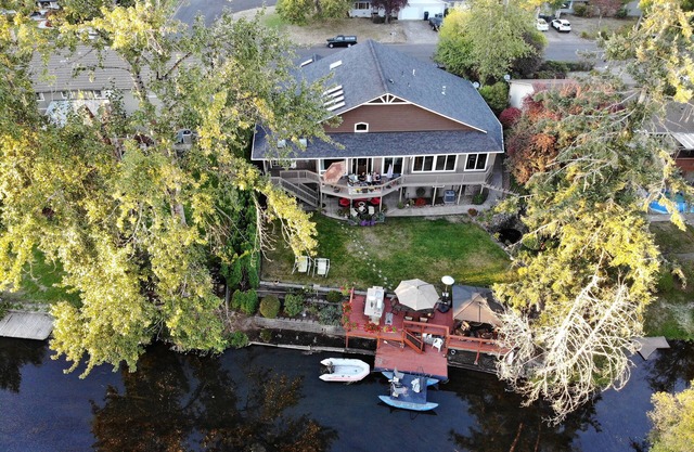 On the river with your own private boat and dock!Moments from downtown!