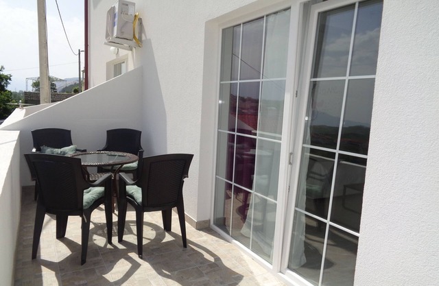 One bedroom apartment with terrace and sea view Lopar, Rab (A-17103-b)