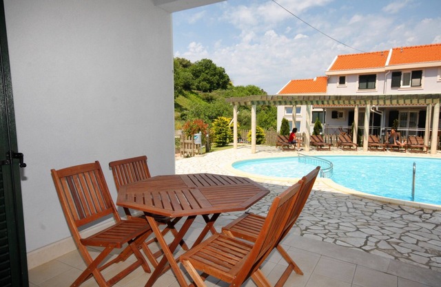 One bedroom apartment with terrace Kampor, Rab (A-3214-b)
