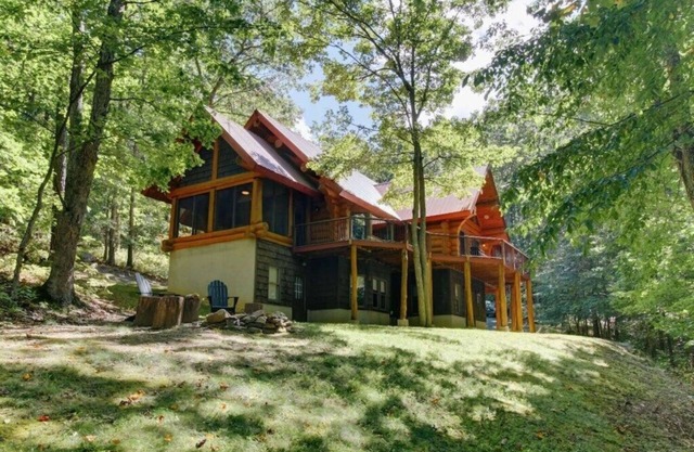 One of a Kind Log Home Tucked Away in the Woods!