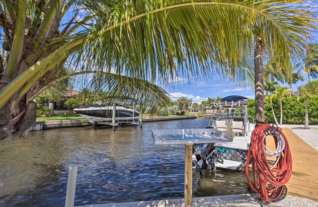 Palm City Canalfront Home w/Boat Dock & Fire Pit!