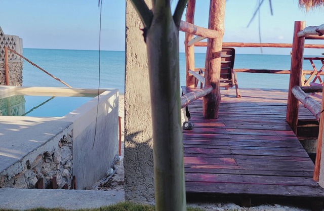 Pasilla suite. Ocean view glass doors to the turquoise water, 13foot Tv screen