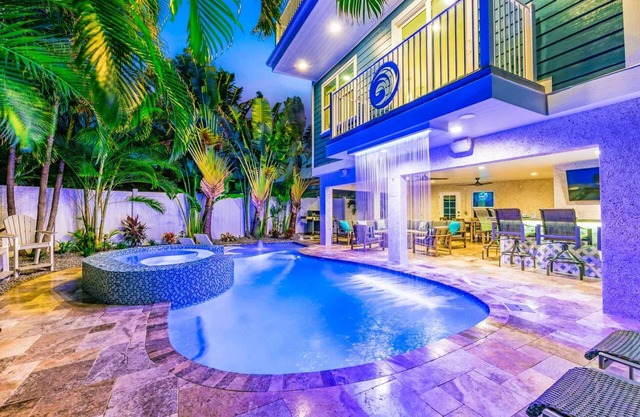 Perfect Location. Roof Top Deck. Gulf Views. Heated Pool/Spa w/Rain Curtain