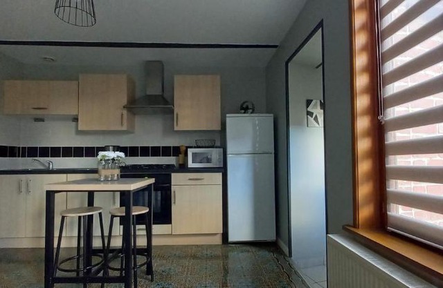 Petite maison avec petit jardin privé