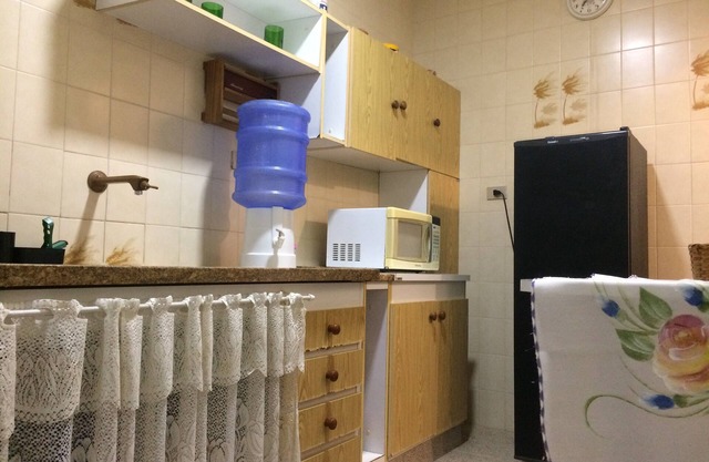 Praia Grande- Canto do forte- Building facing the sea- feet in the sand!