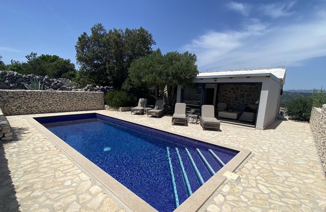 Private Cottage in olive grove with heated Pool.