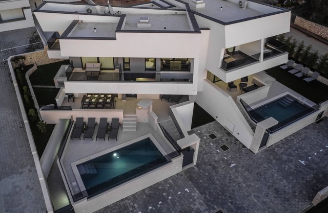 Private luxury villa with pool, sauna, and gym