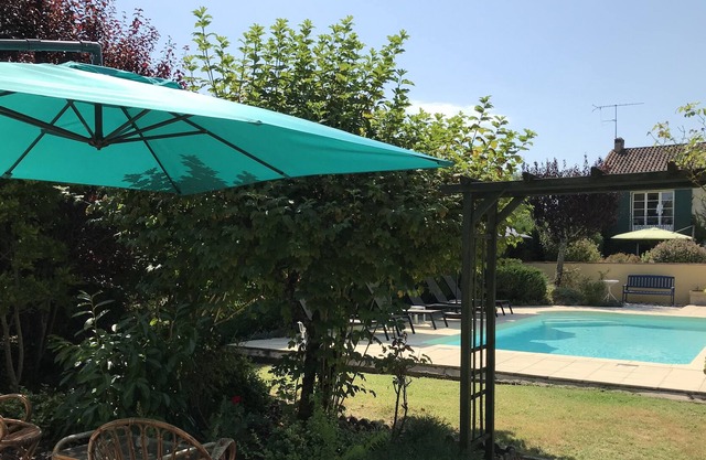 Private villa with pool in pretty Dordogne village. Short walk to water sports