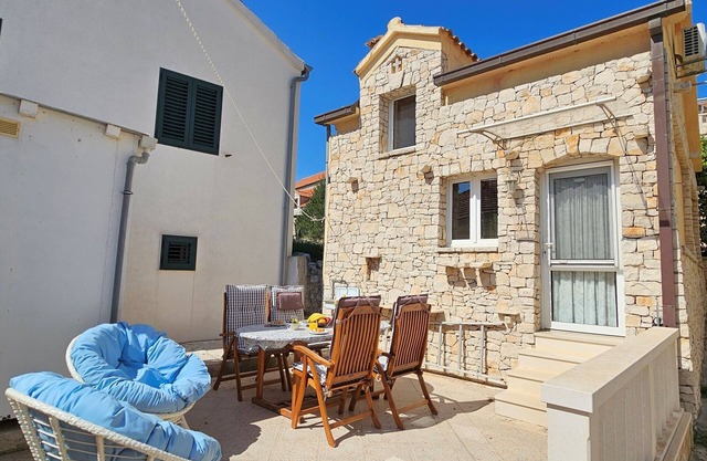 Quaint old stone cottage with large terrace just 150m from the beach