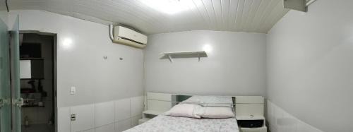 Quarto em casa de família