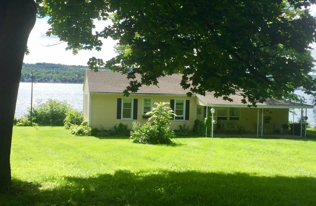 QUINTESSENTIAL FINGER LAKES COTTAGE! CHARM ABOUNDS IN THIS COZY LAKEFRONT GEM!