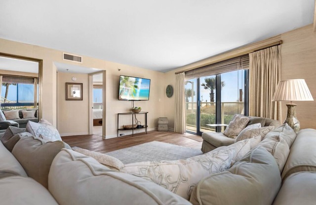 Rate Reduced! First Floor Beachfront, Walkout Patio, Walk out to Beach & Pool