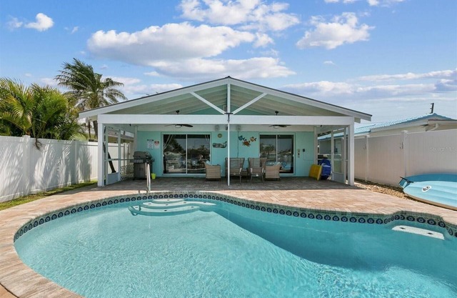 Remodeled Waterfront Home with Heated Pool