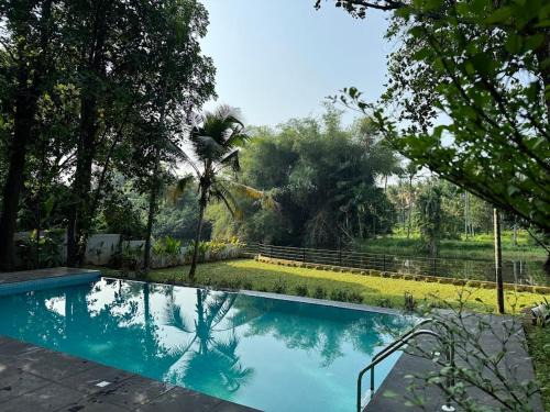 Riverside Private Pool Villa in Kochi - Ohstayz Whispering Grove