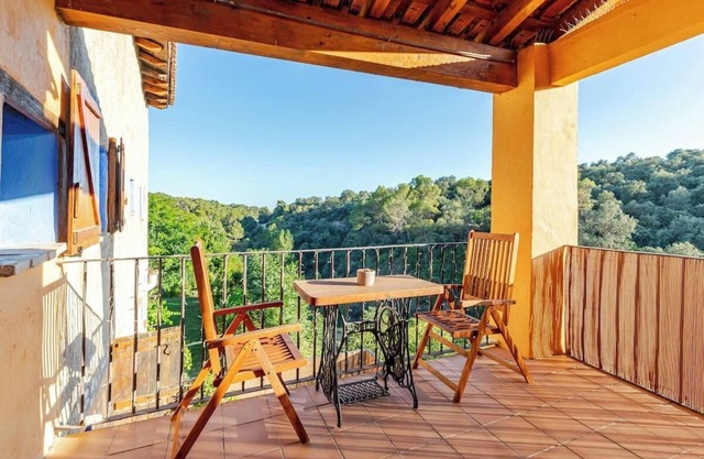 Room with private living room, bathroom and terrace in a rural house