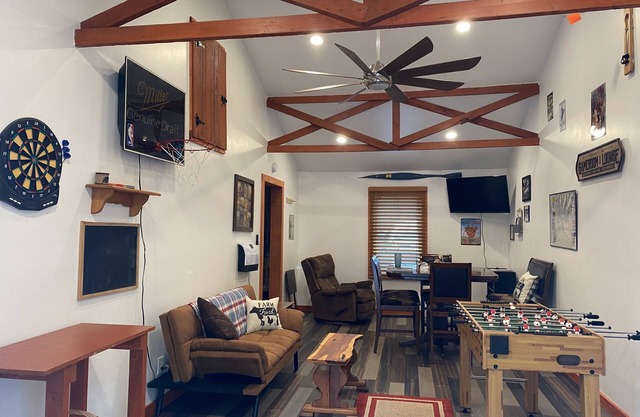 Rustic home on wooded lot, very private. Lake and dock access. Close to trails.