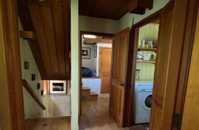 Rustic house tucked into the woods