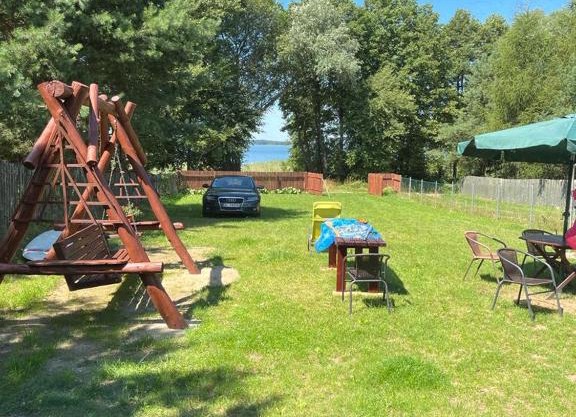 Słońce i Woda - 2 domki nad brzegiem jeziora Śniardwy z własnym pomostem, zejściem do wody i przecudnym widokiem na jezioro