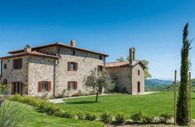 Stunningly restored, 16th century hilltop property with adjoining church