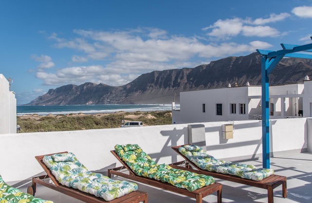 Sandy Bay Home with roof terrace and sea views