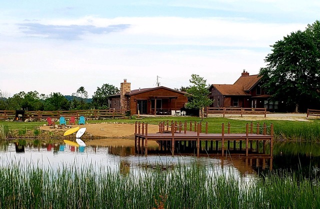 Scenic 6 Bedroom Lodge w/adjoining 2 Bedroom Cabin. Lg. pond w/swimming access.