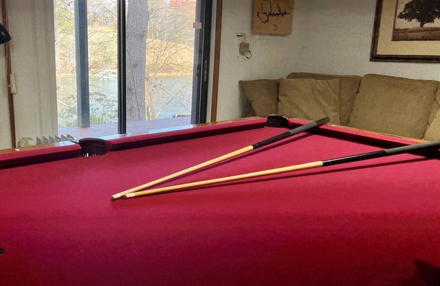 Secluded lakefront bliss with a private deck, pool table, and ping pong!