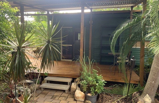 Self contained Cabin 5 metres from pool on 5 acres of tropical and native garden