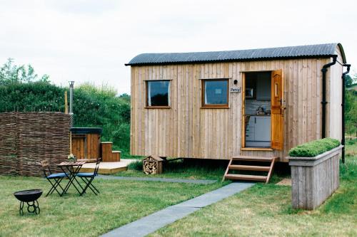 Shepherd's Huts in Barley Meadow at Spring Hill Farm