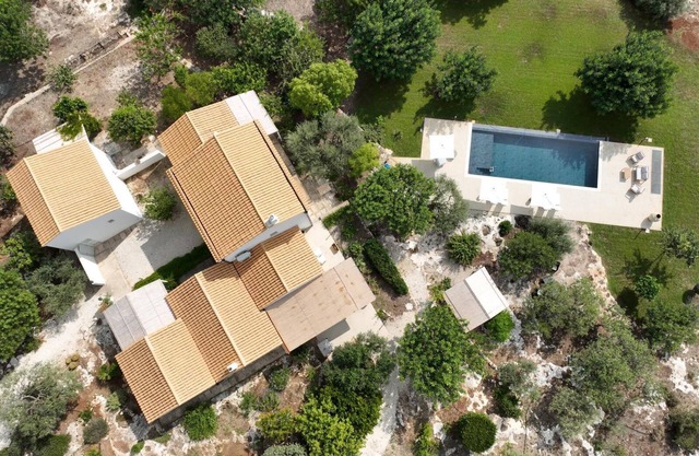 Sicilian farmhouse with pool surrounded by greenery