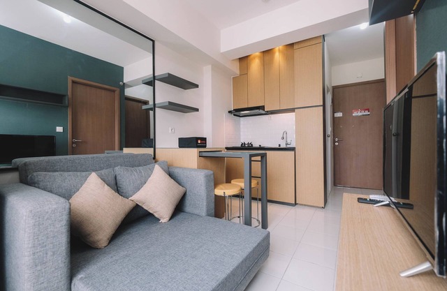 Simple and Cozy Living 2BR at Podomoro Golf View Apartment