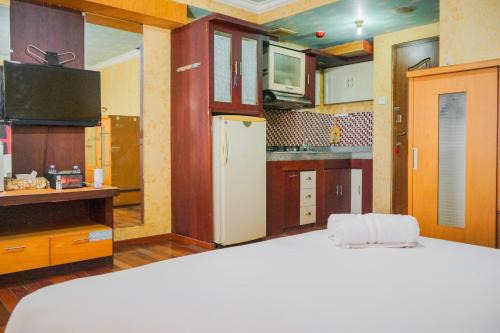 Simple and Minimalist Studio Apartment at Great Western Resort By Travelio