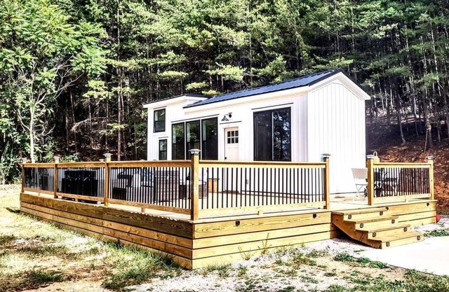 Simple meets modern in this farmhouse style tiny home!