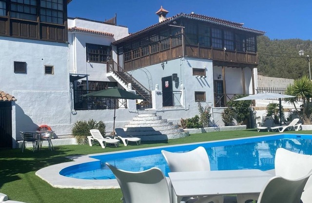 Single room with a single bed and en-suite bathroom. The window looks out onto the patio area