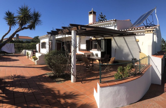 Single Storey house with beautiful garden and large terraces.