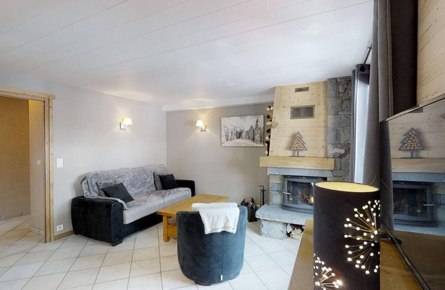 Ski-In/Ski-Out 2BR Apartment with Garden, BBQ, and Stunning Mountain Views