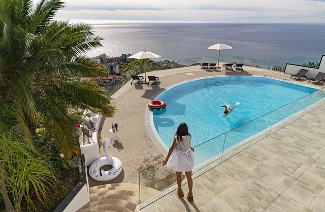 Sky Villa, pool and view in a luxury urbanization.