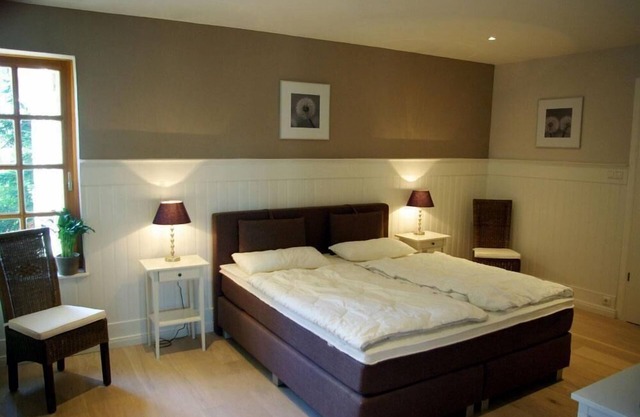 Small holiday apartment with a bow front and a great view of the natural pond