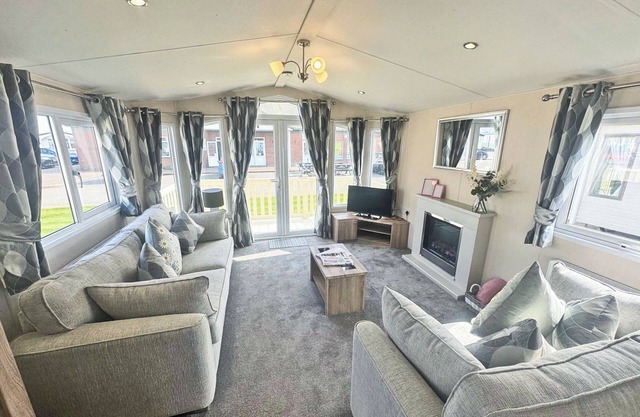 Smart, modern two bedroom caravan, perfect for couples and families alike.