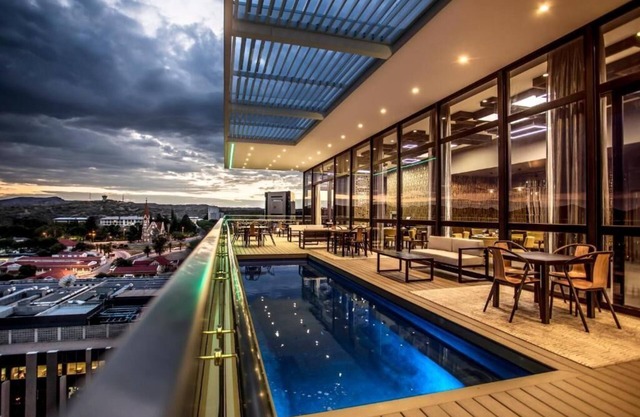 Soak Up the Sun by the Rooftop Pool! Onsite Spa, Parking, Short Walk to Zoo Park