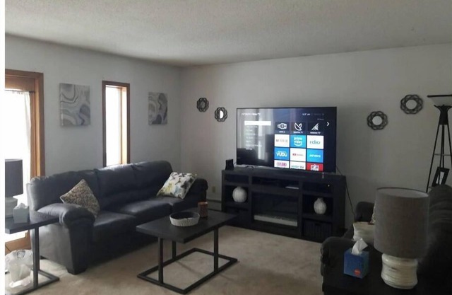 Spacious 1 BR Apartment located above a Salon.