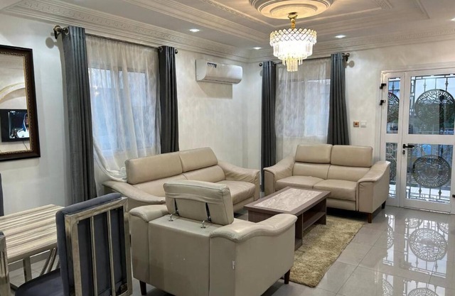 Spacious 2-bedroom apartment with fitness room, WiFi in welcoming Douala