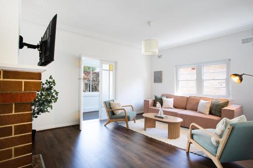 Spacious 2BR Retreat with Garden, BBQ & Free Parking
