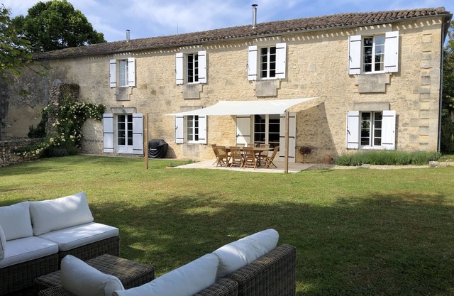 Spacious holiday home with a pool & private garden.