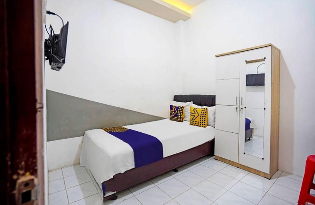 SPOT ON 91360 Swk 68 Syariah