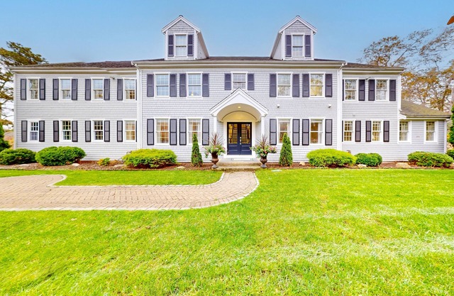 Sprawling dog-friendly lake estate with pool, patio, fire pit, games, & views