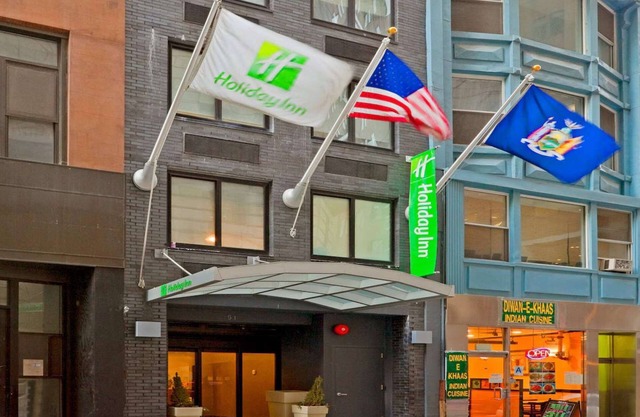 Steps from Wall Street + Fitness Room & Wi-Fi